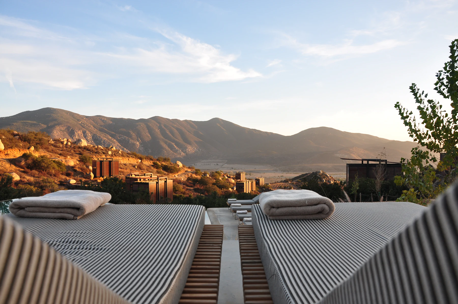 The pool terrace looking west toward the Blue Ridge foothills in the late light