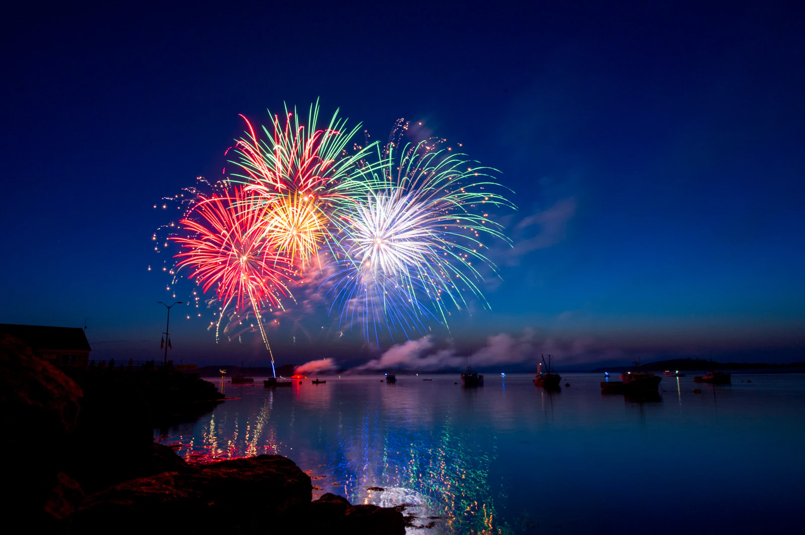 Fireworks over Calloway Pond on the Fourth of July, fired from the same rise since 1964