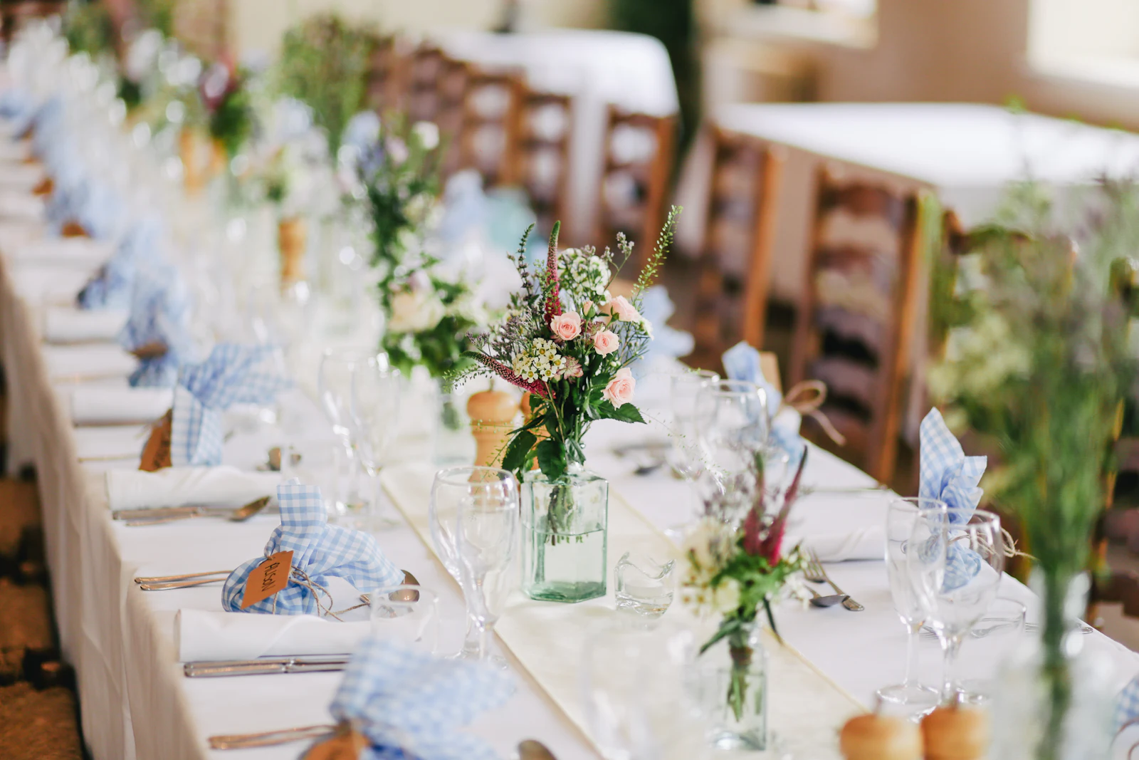 The head table under garden flowers for a September wedding in the Ballroom