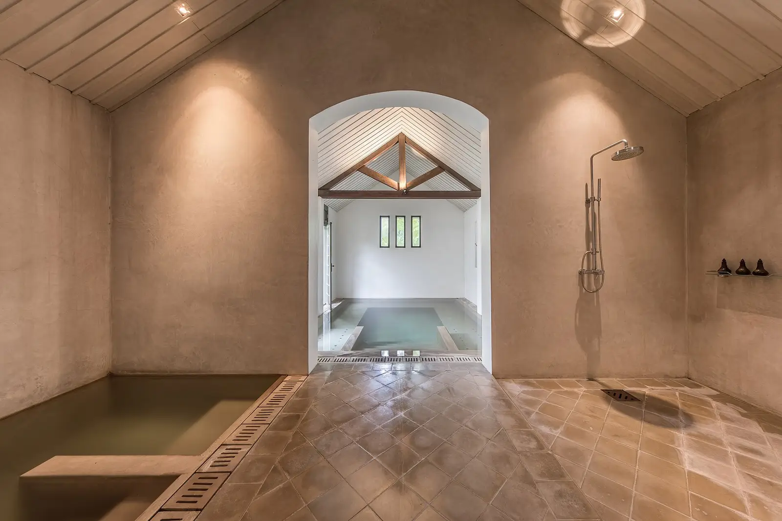 The marble wet room of the Stillhouse, its warm rain showers kept against the cold spring plunge